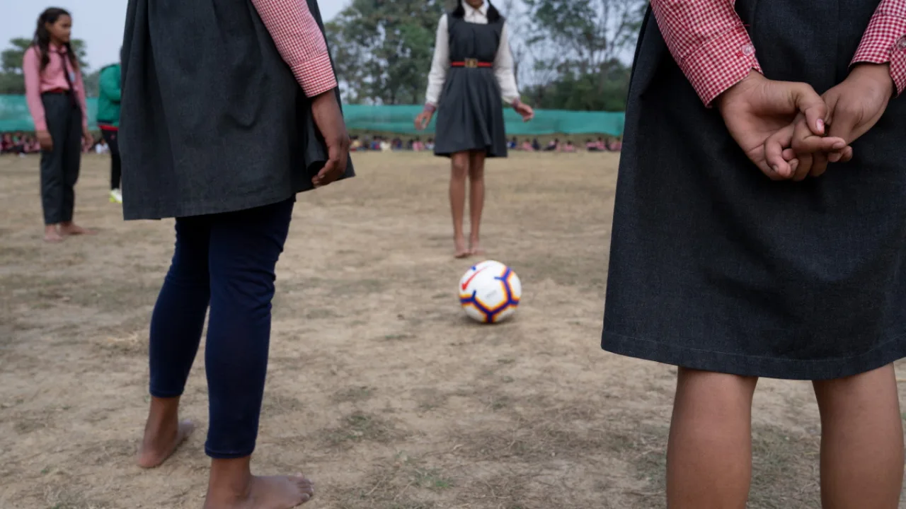 Indian schoolgirls playing football
